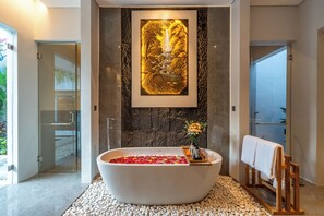 Shower, free toiletries, hair dryer, slippers