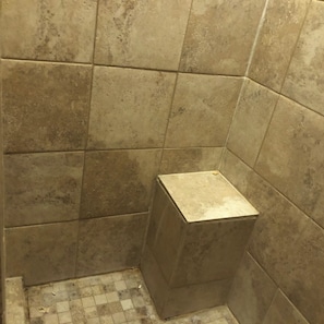 Shower, towels, soap, toilet paper