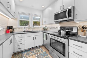 Fridge, dishwasher, coffee/tea maker, toaster