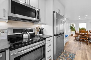 Fridge, dishwasher, coffee/tea maker, toaster