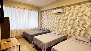 Family Apartment, Multiple Beds | Desk, laptop workspace, free WiFi
