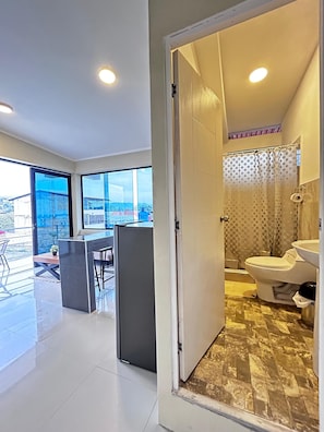 Family Apartment, Multiple Beds | Bathroom | Shower, towels, soap, toilet paper