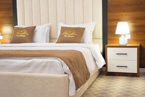 Family Quadruple Room, Balcony, Garden View | In-room safe, desk, laptop workspace, iron/ironing board - AirPlaza Hotel (Samarkand)