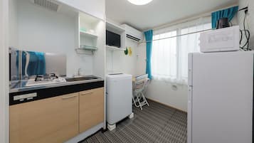Apartment | Private kitchen | Mini-fridge, microwave, stovetop, electric kettle