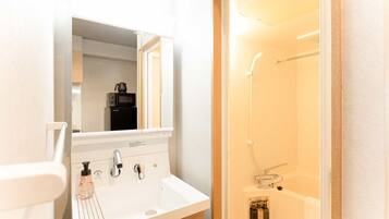 Comfort Quadruple Room, Balcony, City View | Bathroom | Separate tub and shower, free toiletries, hair dryer, slippers