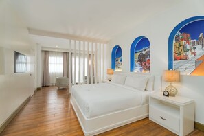 Suite junior, 1 cama King size, para no fumadores, vista a la ciudad | Wifi gratis y acceso para silla de ruedas 