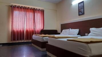 Deluxe Quadruple Room, City View | Desk, free WiFi