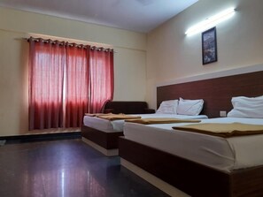 Deluxe Quadruple Room, City View | Desk, free WiFi