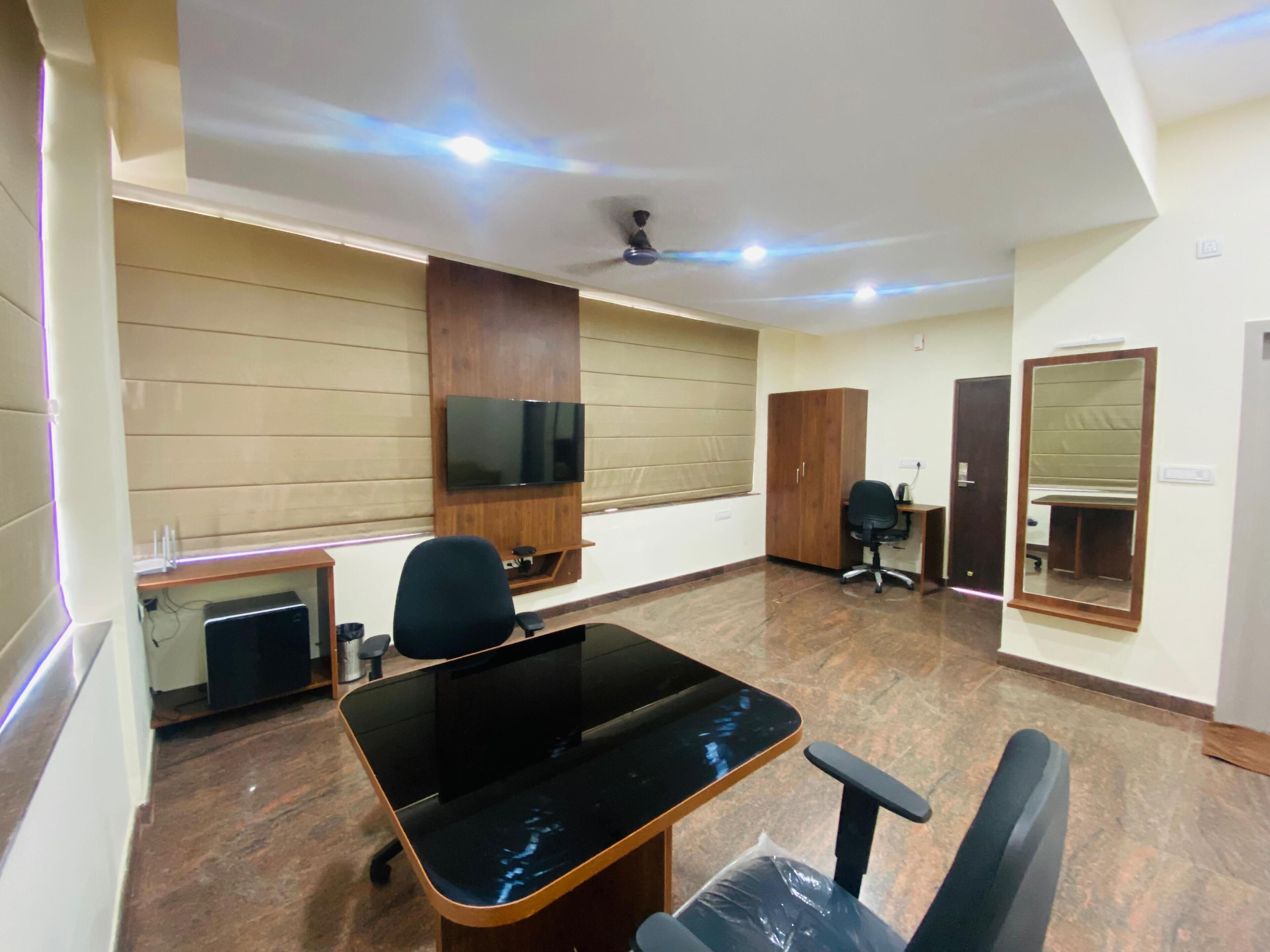 Desk, laptop workspace, free WiFi, bed sheets