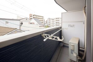 Comfort Room, Balcony, City View | Pillow-top beds, free WiFi, bed sheets, wheelchair access