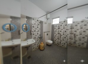 Deluxe Double Room, City View | Bathroom | Shower, free toiletries, towels, soap
