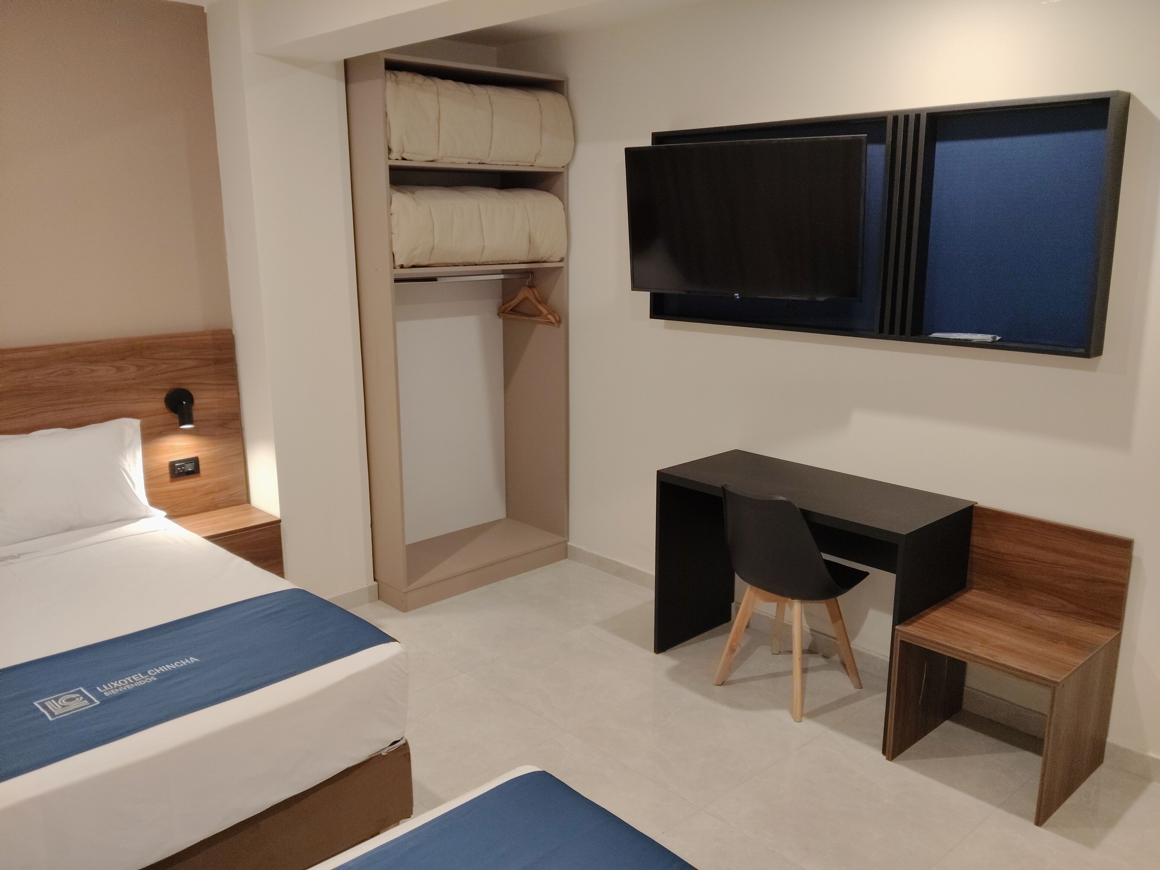 Desk, laptop workspace, blackout curtains, free WiFi