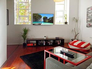 Apartment, 2 Bedrooms, City View | Living room | Books - Unwind in Style at Melbourne's Historic Art Deco Apartment With Pool Gym Carpark (Melbourne)