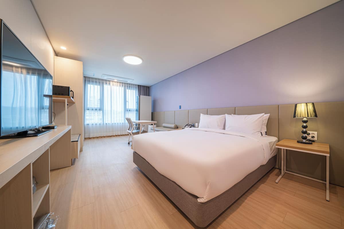 Deluxe Double Room, City View | In-room safe, laptop workspace, soundproofing, iron/ironing board