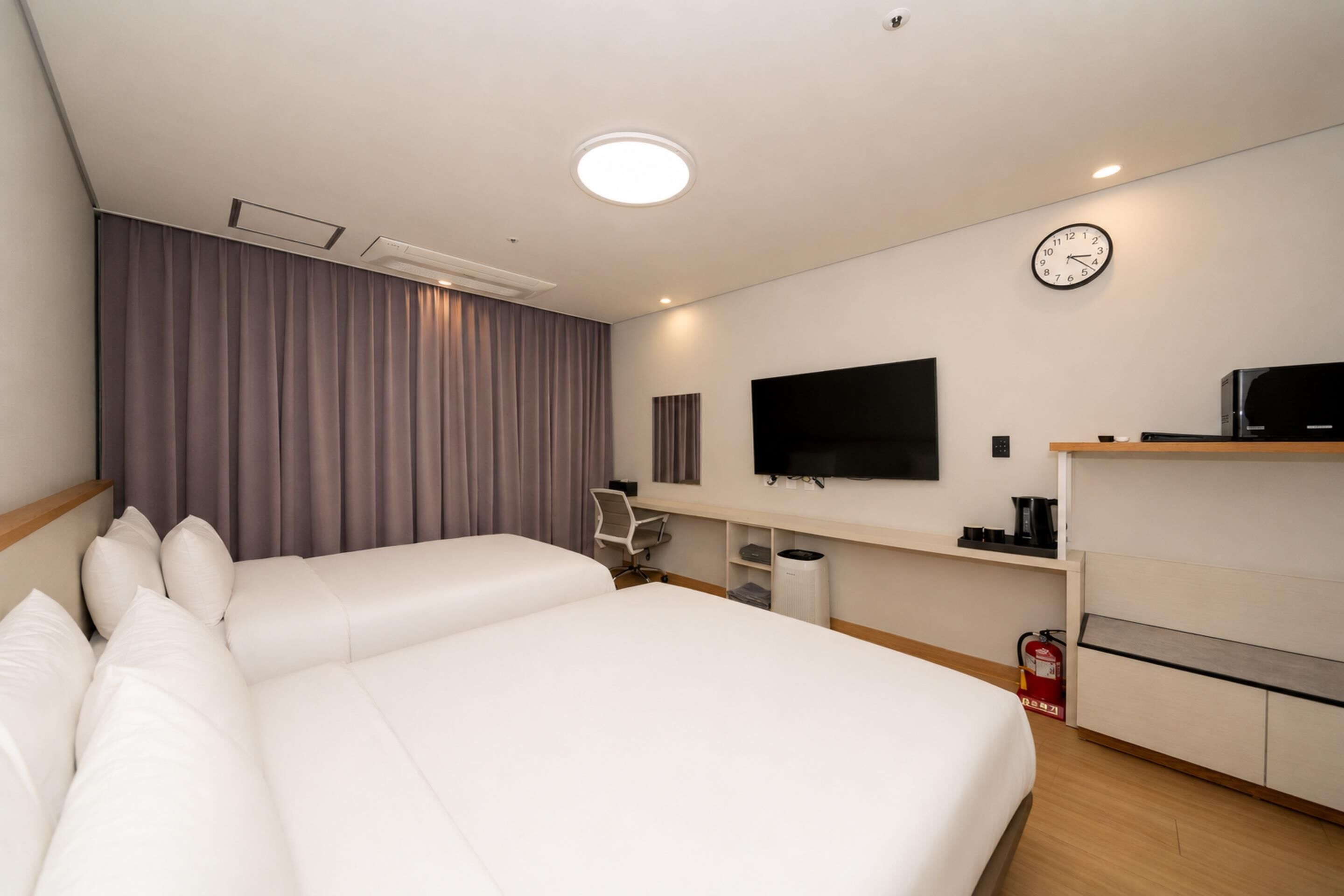 Standard Room, Multiple Beds, Non Smoking, Refrigerator & Microwave | In-room safe, laptop workspace, soundproofing, iron/ironing board