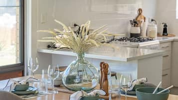 Fridge, coffee/tea maker, cookware/dishes/utensils