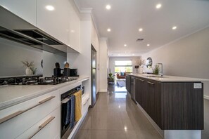 Fridge, microwave, oven, stovetop - Coast on Clovelly - Beachside Living (Christies Beach)
