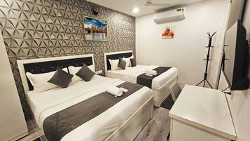 Family Quadruple Room, Pool View | Desk, laptop workspace, free WiFi