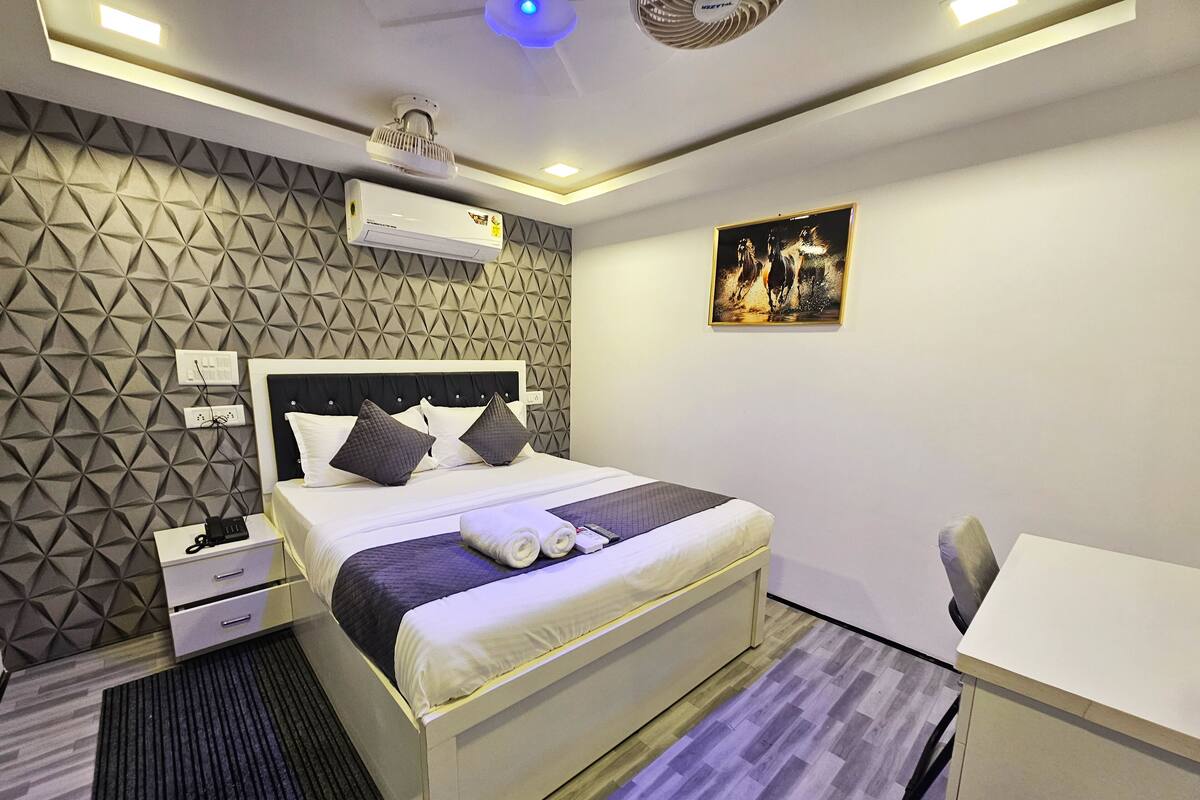 Deluxe Double Room, Pool View | Desk, laptop workspace, free WiFi
