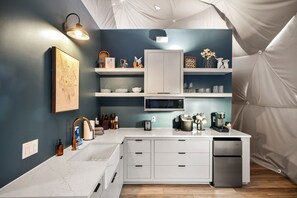 Microwave, stovetop, coffee/tea maker, toaster