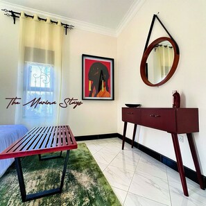 Deluxe Room, Hill View | In-room safe, desk, laptop workspace, blackout drapes - The Marina Stays Private Hotel & Spa (Entebbe)