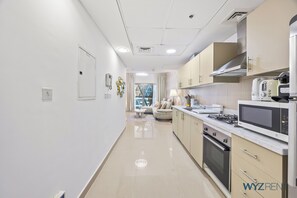 Standard Apartment, City View | Private kitchen - Plush 1BR DIFC & Museum of the Future (Dubai)