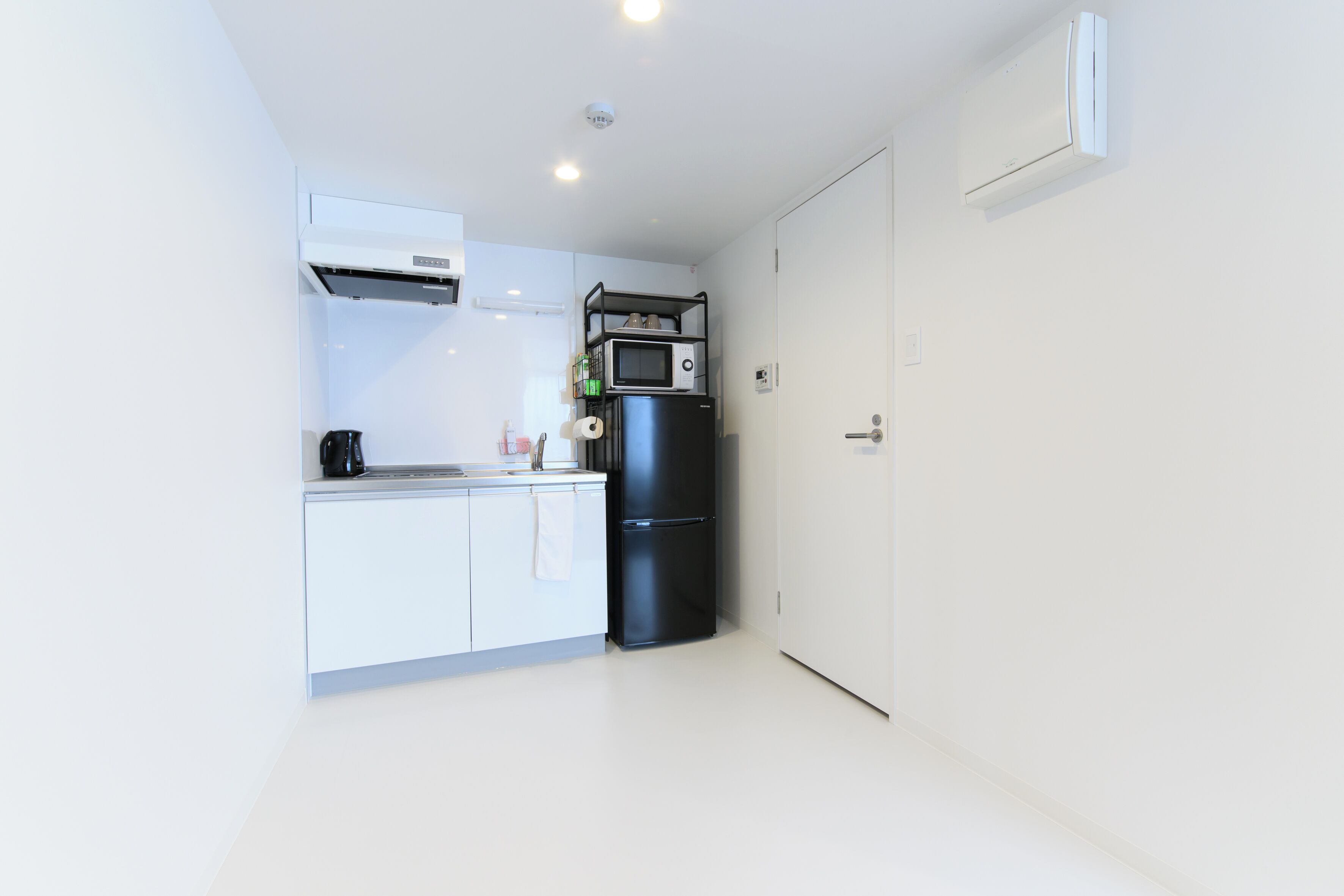 スタジオ ダブルベッド 1 台 禁煙 | 専用キッチン | 冷蔵庫、電子レンジ、コンロ、調理器具と食器