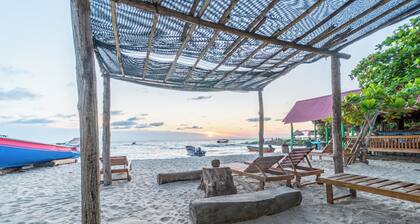 Spacious beachfront house in RincĂłn del Mar, white, comfortable, fresh and bright.