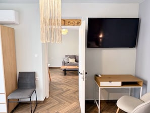 Apartamento, 2 quartos, para fumantes, vista para a cidade | Área de estar