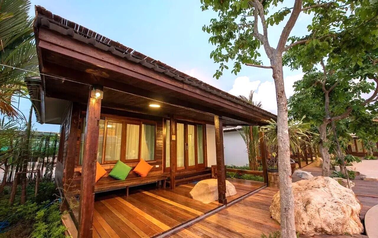 Deluxe Double Room, Balcony, Pool View | Living area | 35-inch TV with digital channels