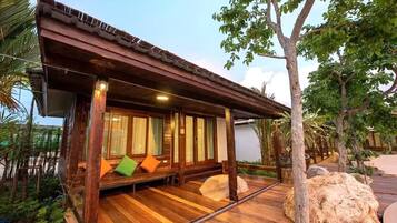 Deluxe Double Room, Balcony, Pool View | Living area | 35-inch TV with digital channels