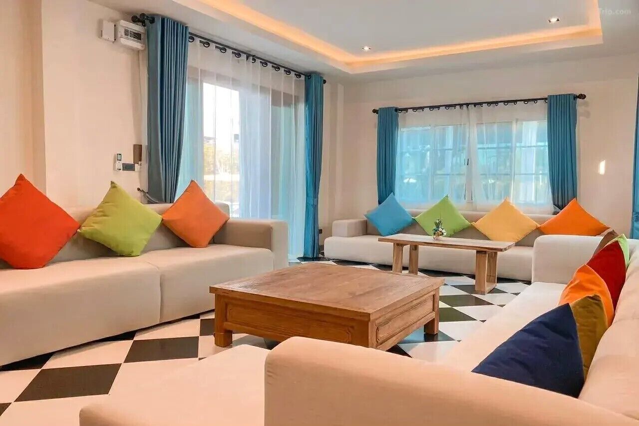 Grand Studio Suite, Multiple Bedrooms | Living area | 35-inch TV with digital channels