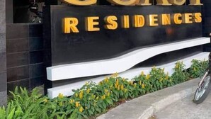 A sign for Coast Residences with large, bold lettering. - Modern Comfort in Pasay with Pool (Pasay)