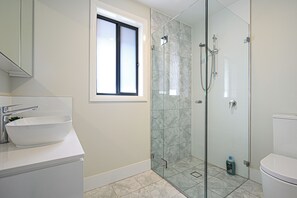 Hair dryer, towels, soap, toilet paper