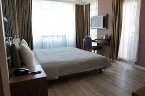 Standard Double Room Single Use, City View | In-room safe, desk, soundproofing, iron/ironing board