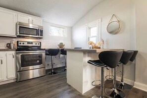 Fridge, microwave, oven, stovetop - 4BR/2BA Spacious Louisville Getaway by CozySuites (Louisville)