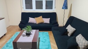Appartement, 1 chambre, fumeurs, vue ville | Coin séjour