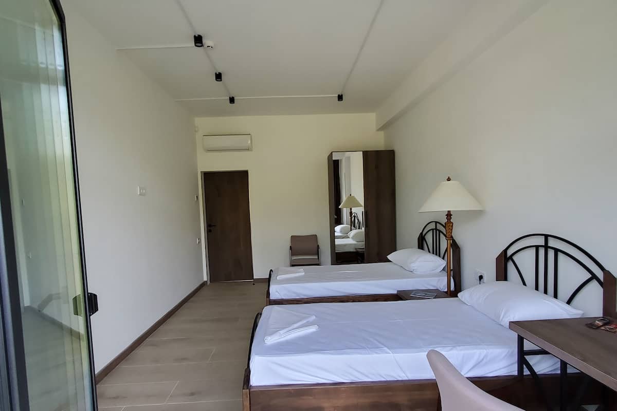 Deluxe Twin Room, Balcony, Mountain View | Premium bedding, Tempur-Pedic beds, desk, laptop workspace