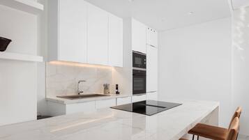 Deluxe Apartment, Balcony, City View | Private kitchen | Full-sized fridge, microwave, oven, stovetop