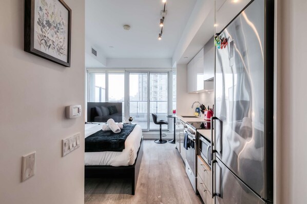 1 غرفة نوم ومكواة/لوح كي وواي فاي وملاءات أسرّة