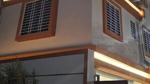 A multi-story building with a sign reading "AATITHYA RESIDENCY" at the top. - Aatithya Residency (Rajgurunagar)