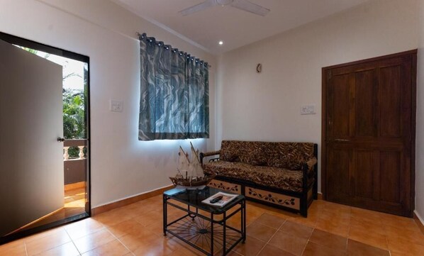 Deluxe Room, Balcony, City View | In-room safe, desk, iron/ironing board