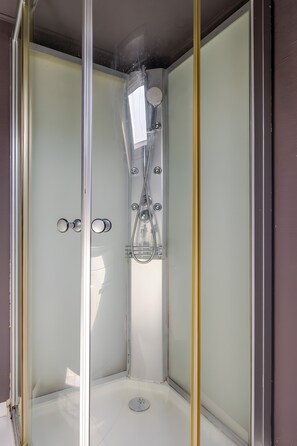 Shower, free toiletries, hair dryer, towels