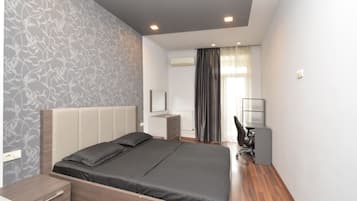 Family Apartment | Blackout drapes, iron/ironing board, cribs/infant beds, free WiFi