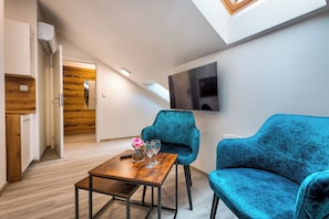 Estúdio urbano, 1 cama King | Wi-Fi de cortesia, roupa de cama