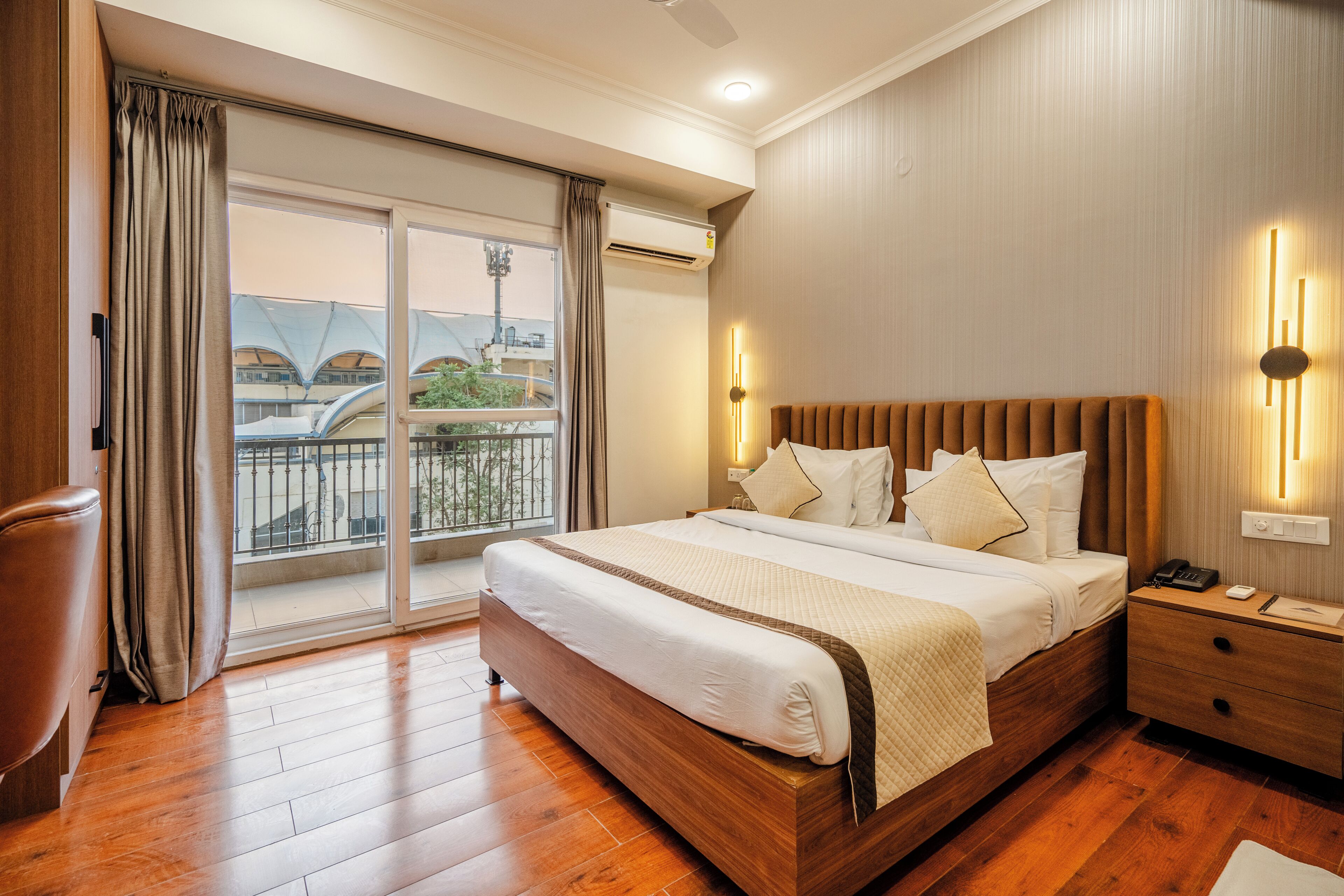 Premium bedding, desk, laptop workspace, blackout curtains