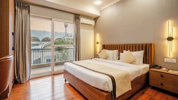 Premium bedding, desk, laptop workspace, blackout curtains