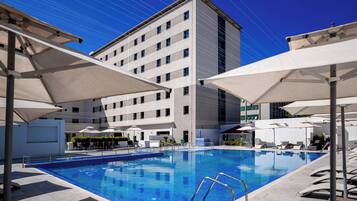 Outdoor pool, pool umbrellas, pool loungers