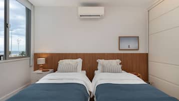 Apartamento básico | Cortinas blackout, ferros/tábuas de passar roupa, Wi-Fi de cortesia