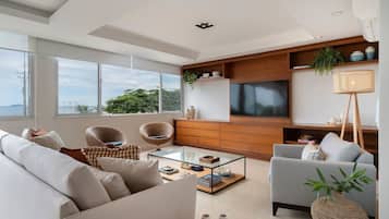 Basic Apartment | Living area | Flat-screen TV